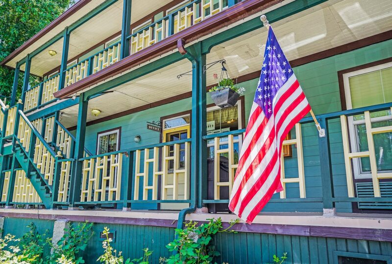 American flag and front porch of the Julian Lodge
